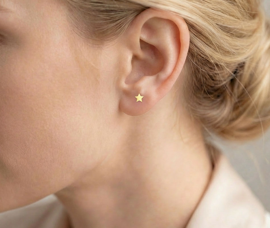 Pendientes con motivo de estrella en oro amarillo de 18K - Imagen 3