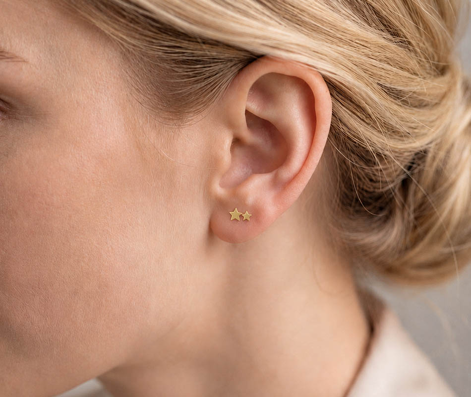 Pendientes motivo doble estrella de oro amarillo de 18K - Imagen 4