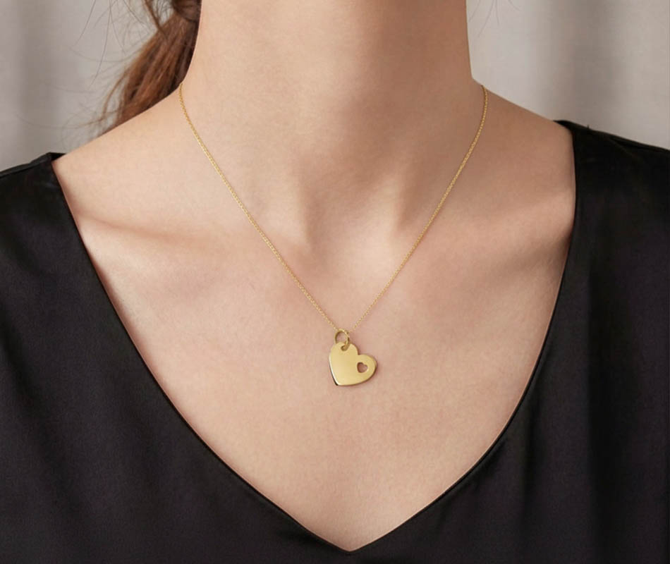 Colgante en oro amarillo de 18K corazón y corazón mini - Imagen 3